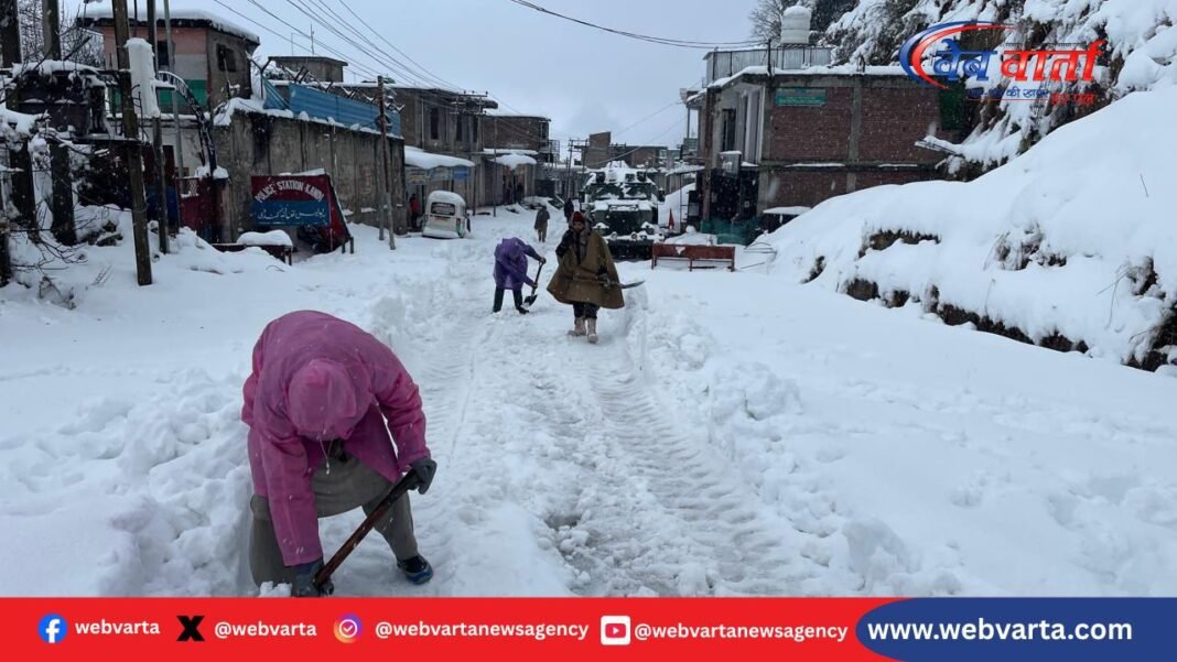 BRO personnel clearing snow to restore road connectivity in Rajouri district