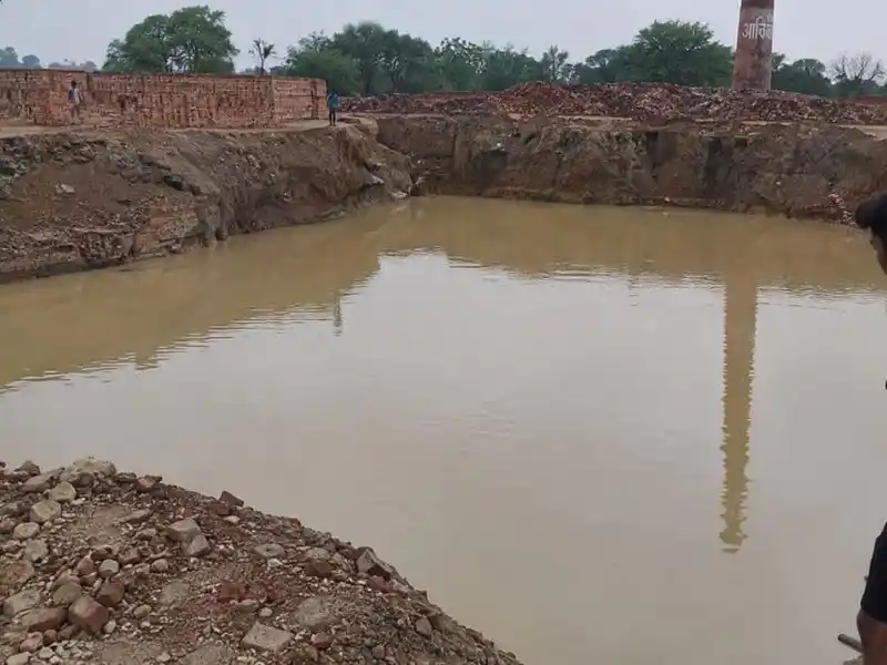 Rain-Filled Pit Swallows Two Innocent Lives